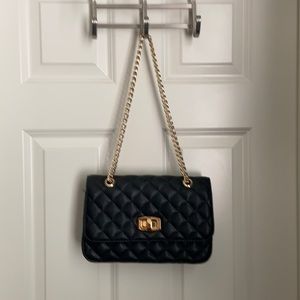 Black quilted Express shoulder bag